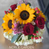Bouquet of sunflowers, red roses, and white hydrangeas