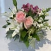 Bouquet of pink roses, white lilies, and magenta alstroemeria
