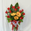 This arrangement is a simple yet captivating piece. With a dozen roses