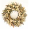 Dried floral wreath with beige and gold tones