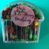 Clear candy container with a "Happy Birthday" label