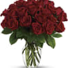 Bouquet of red roses in a clear glass vase