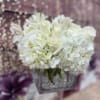 A modern square with crystals and Premium white hydrangea, white roses and