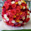 Large round bouquet of multicolored roses