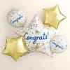 Cluster of congratulatory star-shaped and round balloons