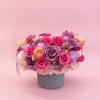 A breathtaking luxury floral arrangement featuring premium lavender and hot pink roses