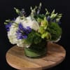 white ranunculus, white hydrangeas, Lisianthus, green cymbidium, blue agapanthus, green dianthus in