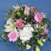 Mixed bouquet with pink gerberas, white lilies, and roses