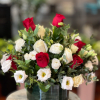 Serenade your love with this beautiful bouquet of red and white roses!