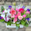 Elegant textures and colors of lavenders and pinks with orchids designed in