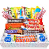 Assorted candy bars arranged in a gift basket