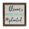 Bloom where you are Planted. All signs are built into a wooden