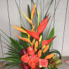 Tropical arrangement with orange roses, lilies, and red heliconia