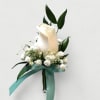 White rose boutonniere with baby's breath and teal ribbon