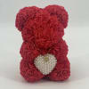 Red rose teddy bear with a pearl heart pendant