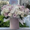 Pink and white rose bouquet in a blush cylindrical box
