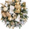 Gold and white holiday wreath with ribbon bows and ornaments