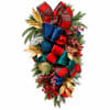 Christmas swag with plaid bows, ornaments, and evergreen branches