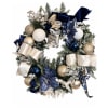 Decorative holiday wreath with blue, gold, and white ornaments and ribbon