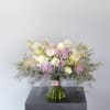 A classic round handtie ribbon wrap bouquet featuring 2 dozen lavender garden