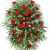 Standing spray of red roses with palm fronds and eucalyptus
