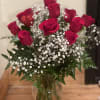 These dozen red roses with baby's breath are classic! 