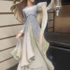 Decorative angel figurine holding a lantern with a printed quote on the base