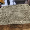Memorial stone with an engraved sympathy poem