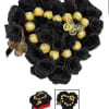 Heart-shaped bouquet of black roses with gold-wrapped chocolates and butterfly accents