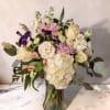This soft and pretty arrangement is just right to show someone you're