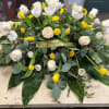 Casket spray with roses and tulips
