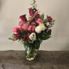 My Crush is a beautiful arrangement in a Jordan vase, with red