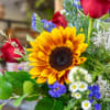 A beautiful vase arrangement or hand held bouquet upon request.