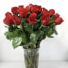 Bouquet of red roses in a clear glass vase