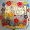 Silver balloon with colorful dots and the words Good Luck!