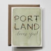 Greeting card with the words "PORTLAND loves you!" on a brown envelope