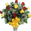 Stunning arrangement of six red and six yellow roses. This favourite gift