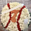 Large funeral wreath of white and red carnations with an orange number 7