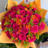 A radiant fall bouquet featuring fuchsia colored and orange roses, golden solidago