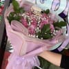 Introducing our exquisite bouquet of purple roses, a symbol of elegance and