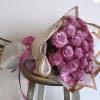  Elevate your gift-giving with a stunning arrangement of 25 luxurious purple