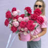 Large pink and hot pink rose bouquet in a pink hat box