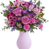 Pink and purple mixed bouquet in a lavender vase