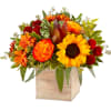 Bright mixed bouquet in a wooden cube vase