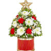 Christmas tree-shaped floral arrangement in a red drum container