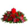 Red candle in a holiday arrangement with plaid ribbon and red flowers