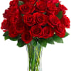 Bouquet of red roses in a clear glass vase