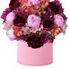 Pink and burgundy flower arrangement in a round pink box