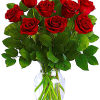 Bouquet of red roses in a clear glass vase