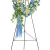 Adorned with trailing ivy, this petite, 16" sweetheart-shaped wreath of sky-blue hydrangea